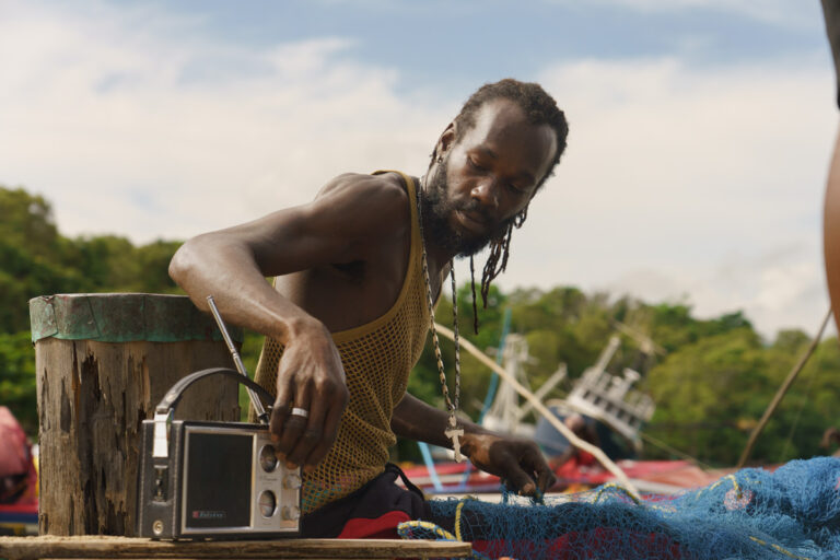 041_JTB_Ocho_Rios_Culture-and-Heritage_Man-listening-to-radio_Beach_2-(1)